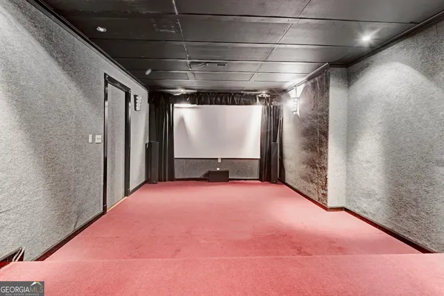 a bathroom with a shower and a sink