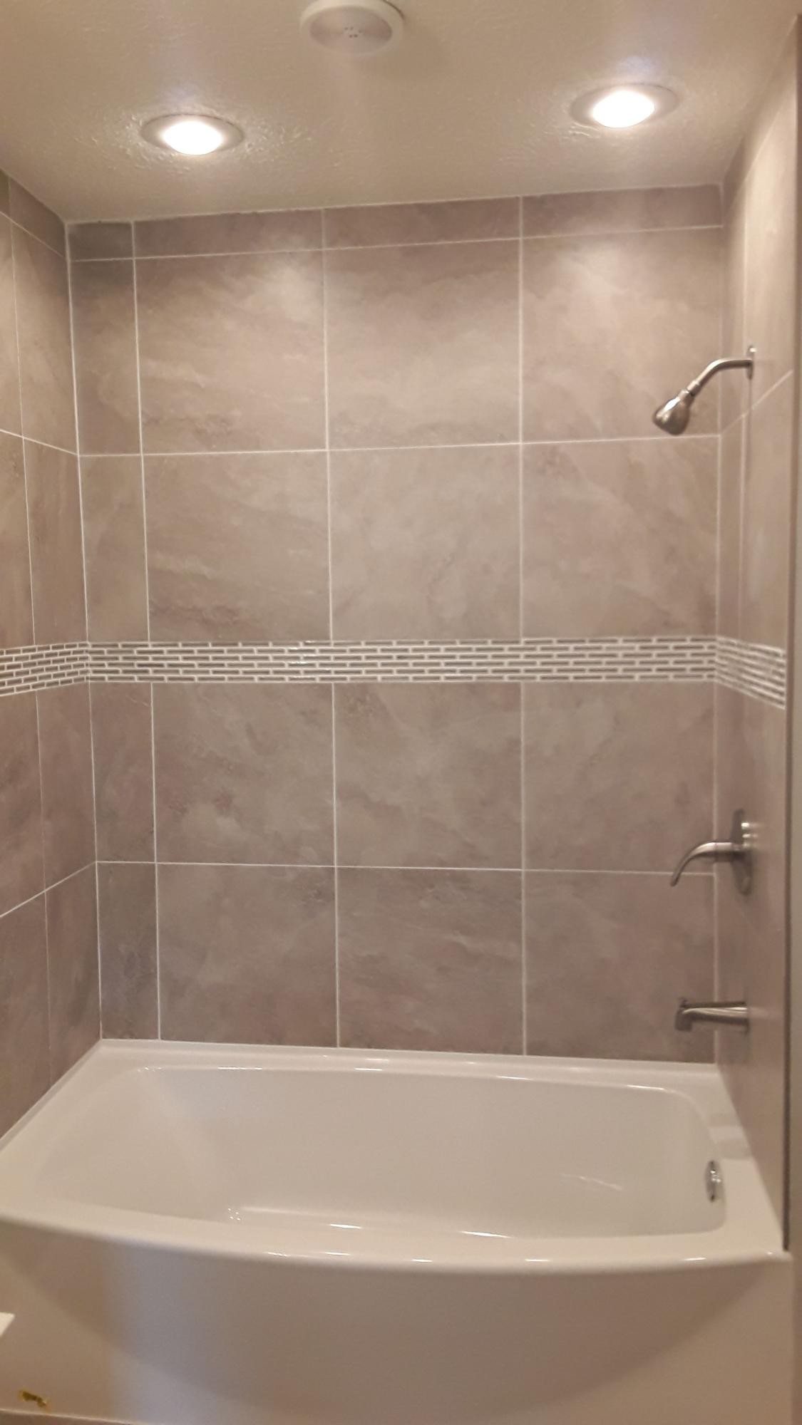 129 Rosedale Avenue Rutledge, TN 37861 - Photo 18 of 34 a bathroom with a bathtub and a shower