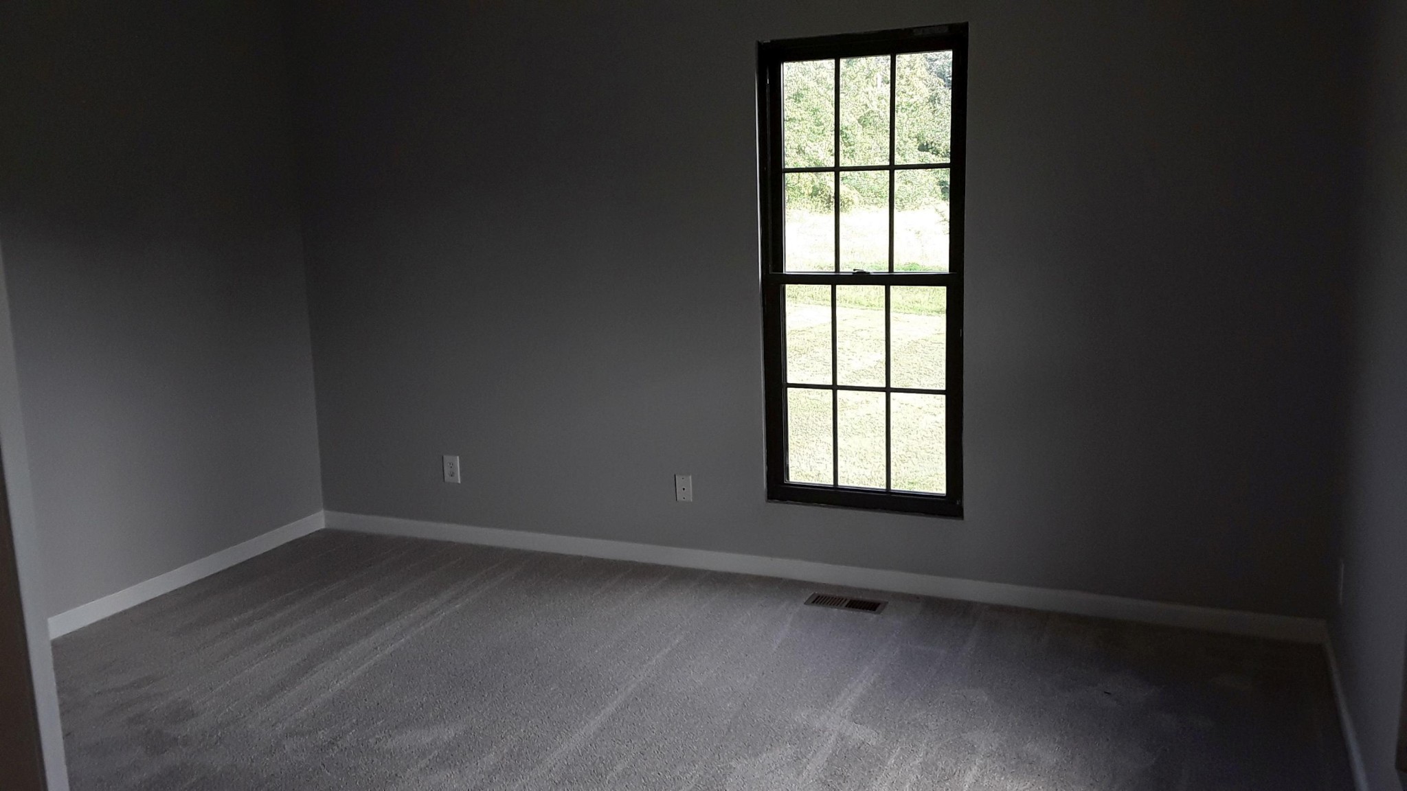 129 Rosedale Avenue Rutledge, TN 37861 - Photo 21 of 34 an empty room with a window