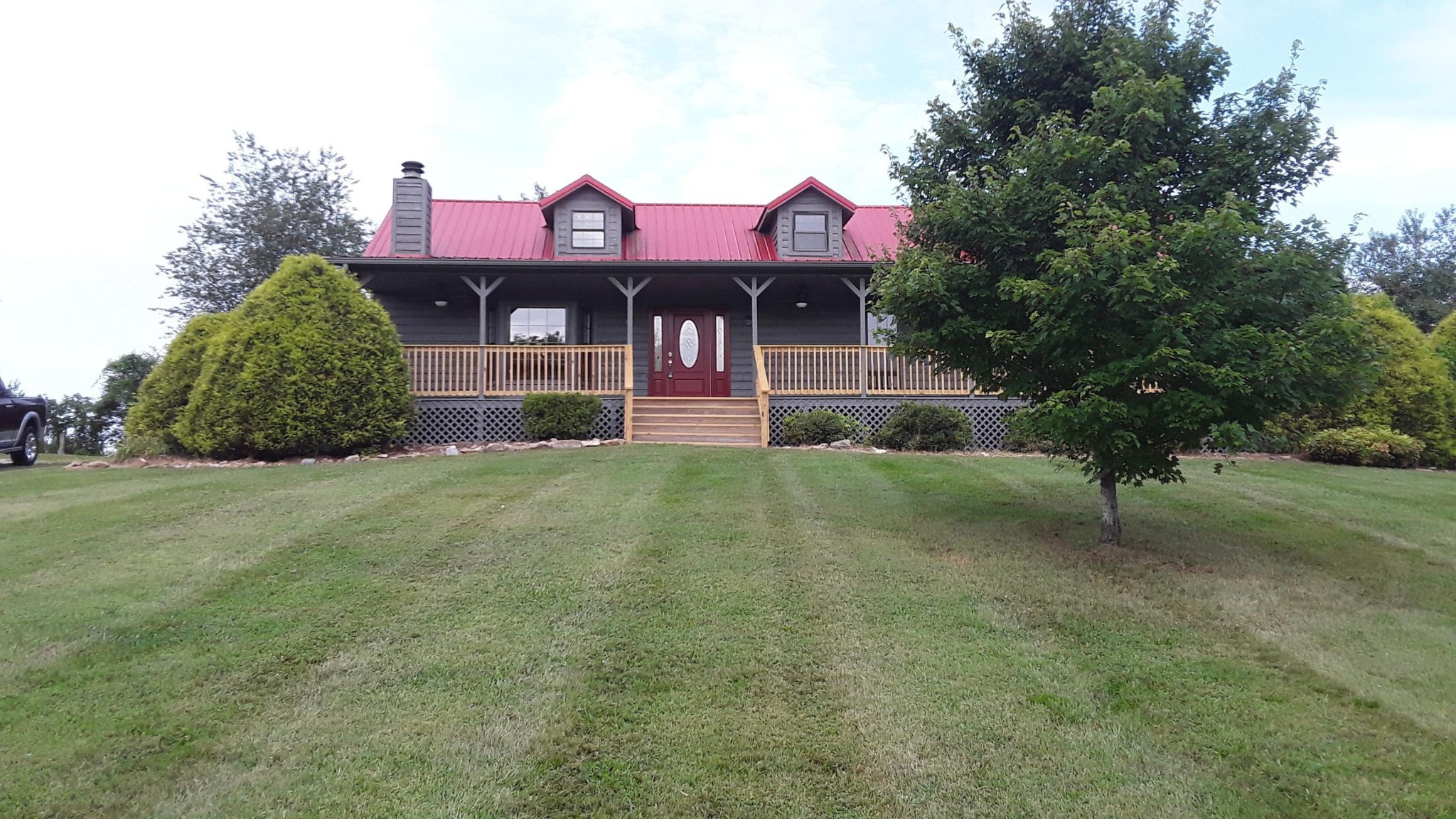 129 Rosedale Avenue Rutledge, TN 37861 - Photo 5 of 34 a front view of a house with a yard