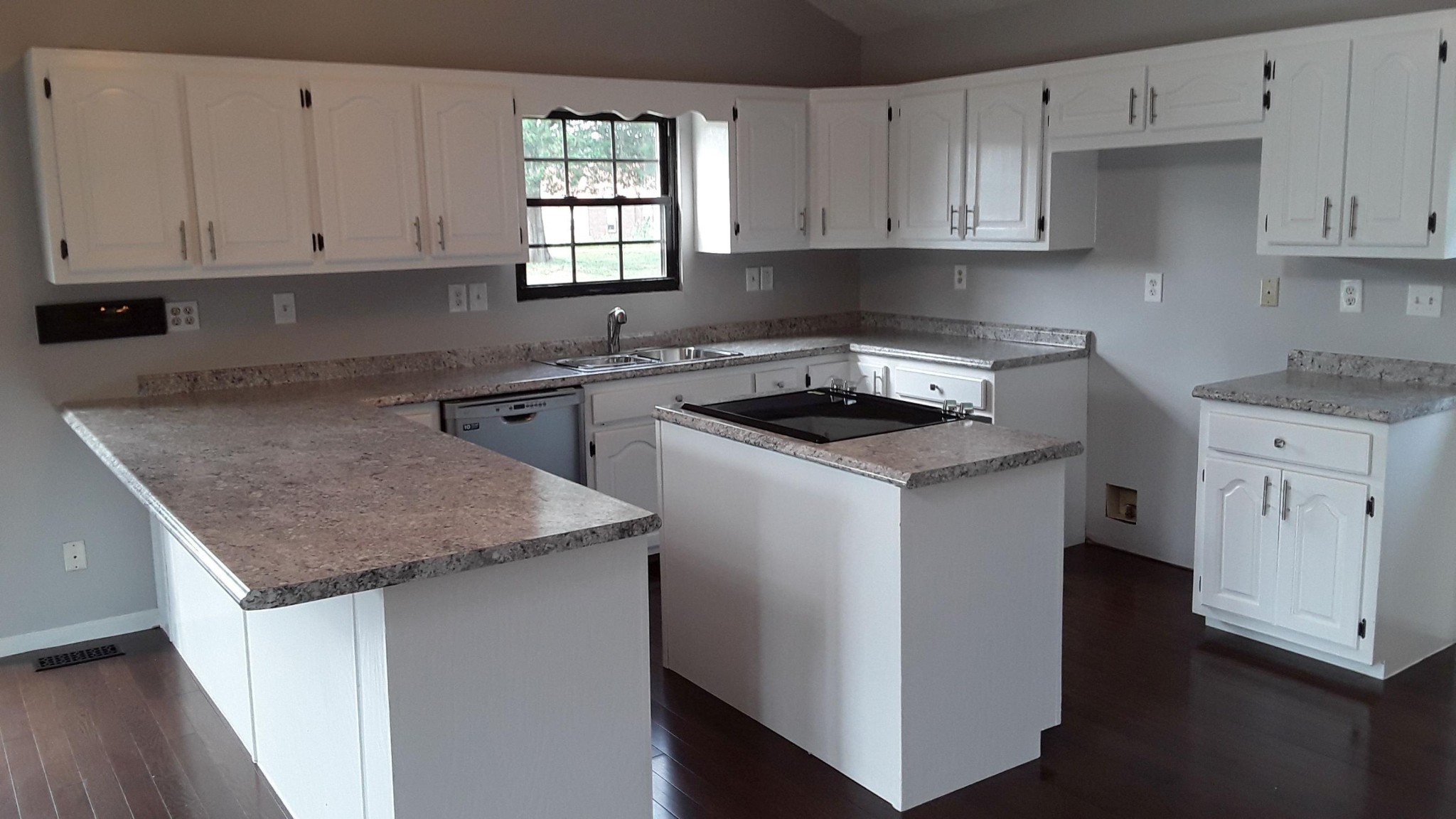 129 Rosedale Avenue Rutledge, TN 37861 - Photo 10 of 34 a kitchen with stainless steel appliances granite countertop a sink stove and cabinets