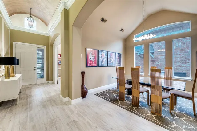 a view of a living room and dining room