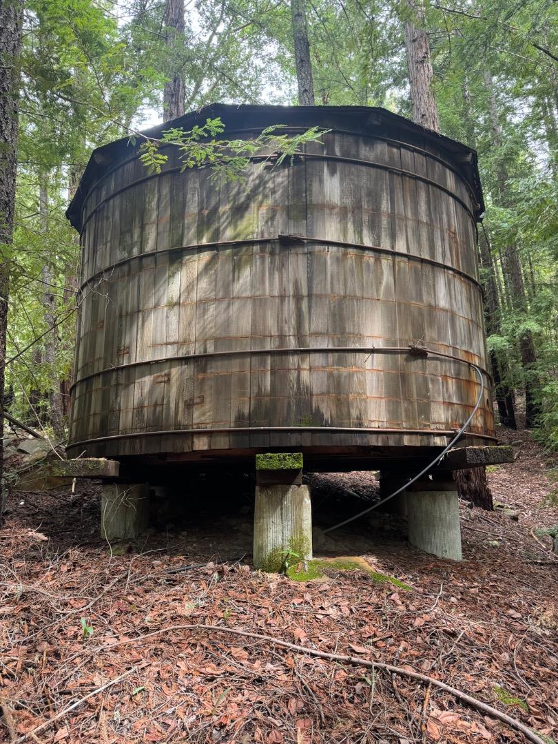 320 Timber Cove Boulder Creek, CA 95006 - Photo 4 of 17 a small pool sitting in the middle of a backyard