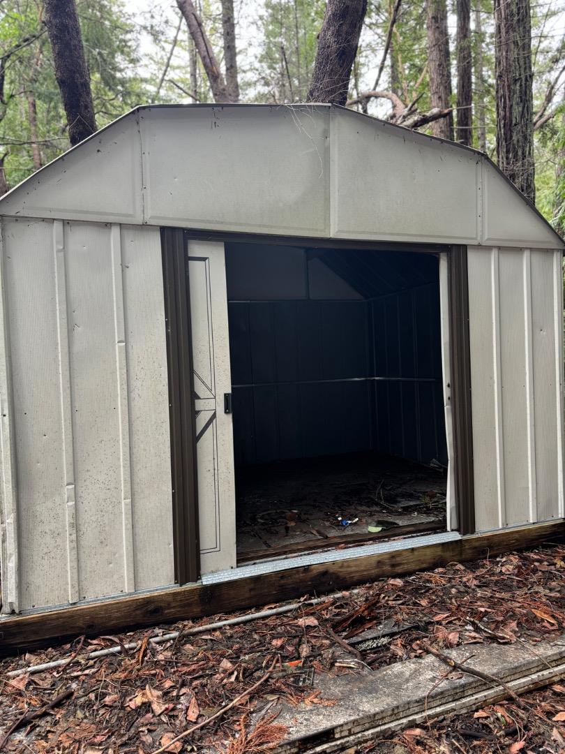 320 Timber Cove Boulder Creek, CA 95006 - Photo 9 of 17 a view of a house with a door