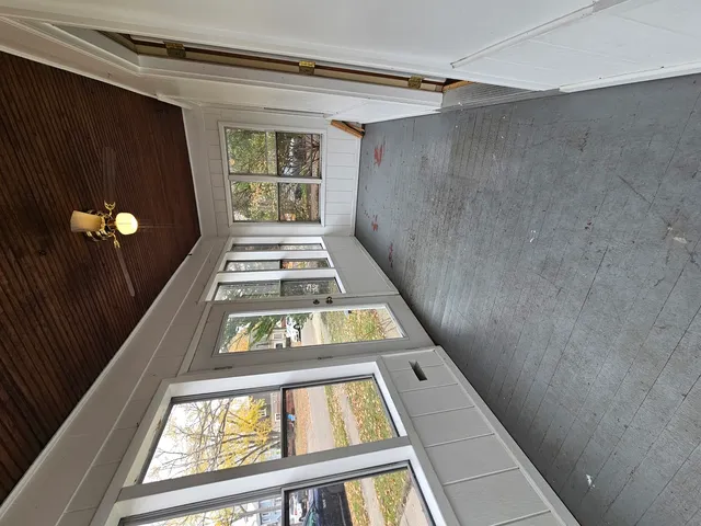 a view of an entryway with a floor