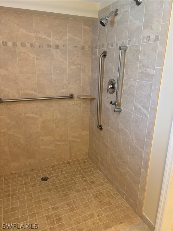5501 Rattlesnake Hammock Road, Unit 107 Naples, FL 34113 - Photo 23 of 23 a bathroom with a shower