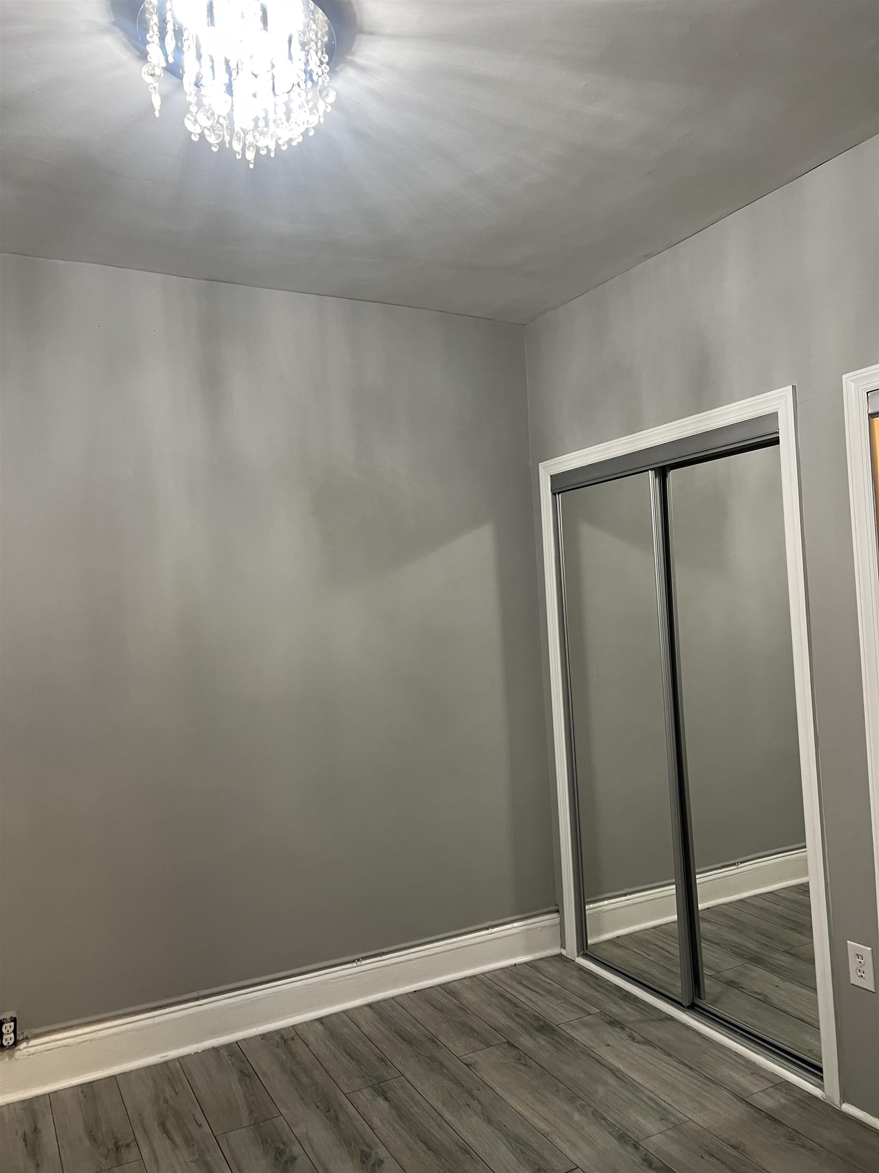 6126 Washington Street, Unit 2 West New York, NJ 07093 - Photo 6 of 7 a view of a small space with wooden floor and staircase