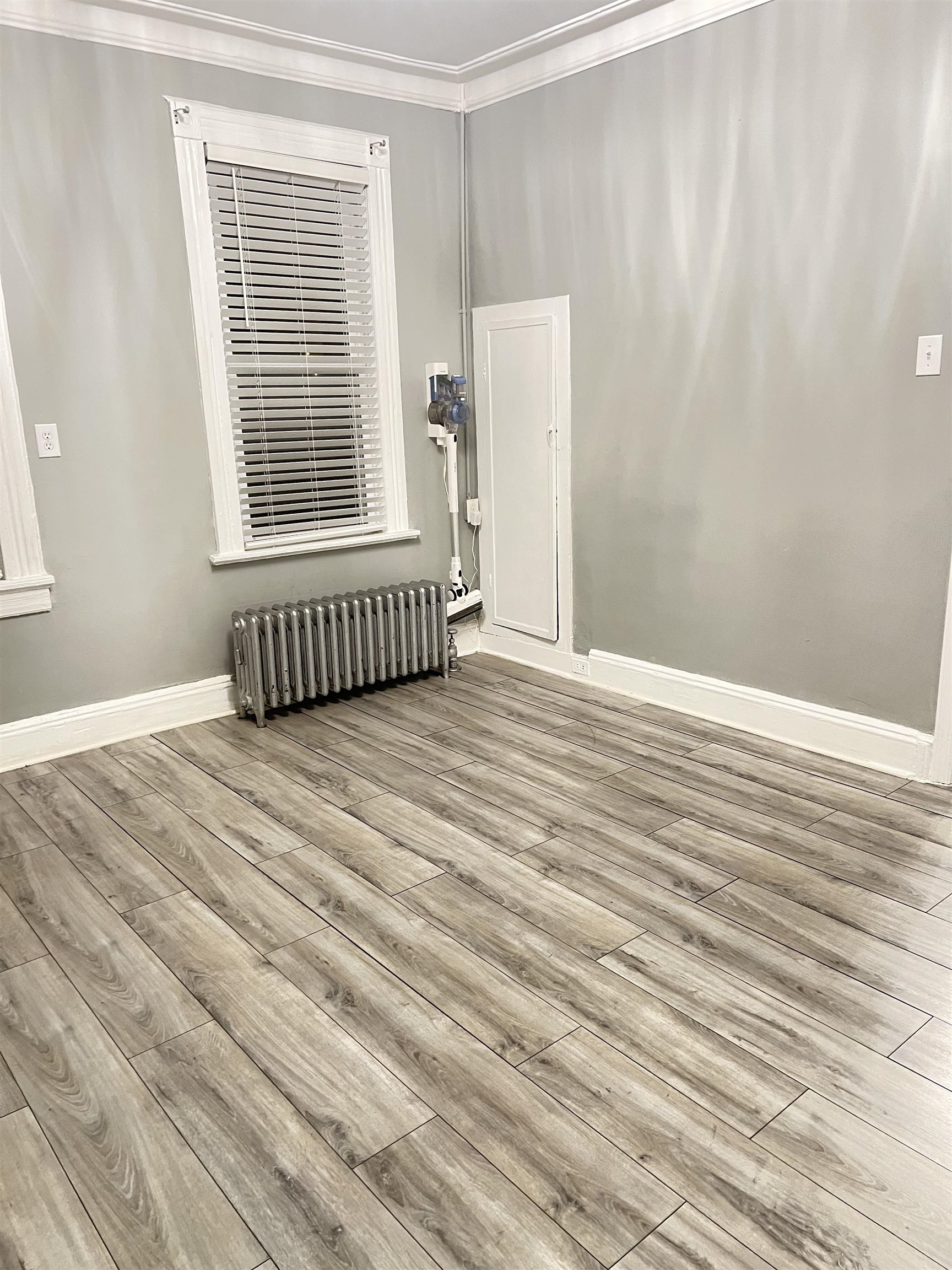 6126 Washington Street, Unit 2 West New York, NJ 07093 - Photo 7 of 7 a view of empty room with wooden floor and fan