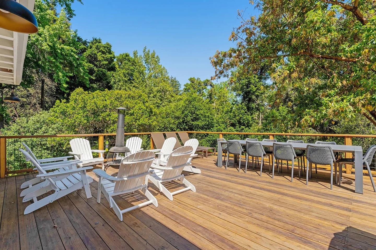 1003 Laurel Glen Road Soquel, CA 95073 - Photo 29 of 101 a roof deck with table and chairs a barbeque with wooden floor and fence