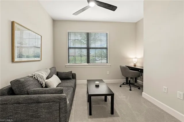 a bathroom with a sink a mirror a toilet and a shower curtain