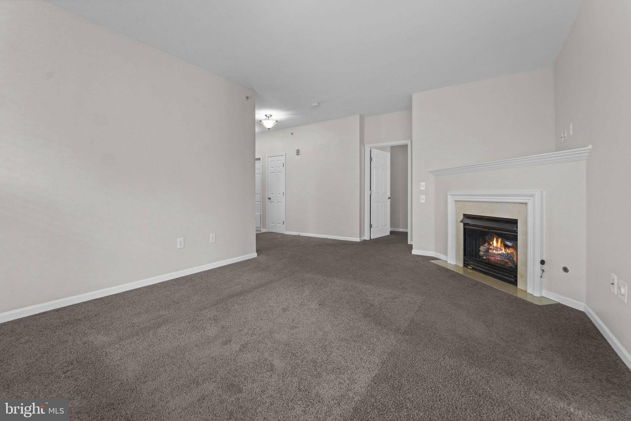 59 Kyle Way Ewing, NJ 08628 - Photo 11 of 35 a view of empty room with a fireplace