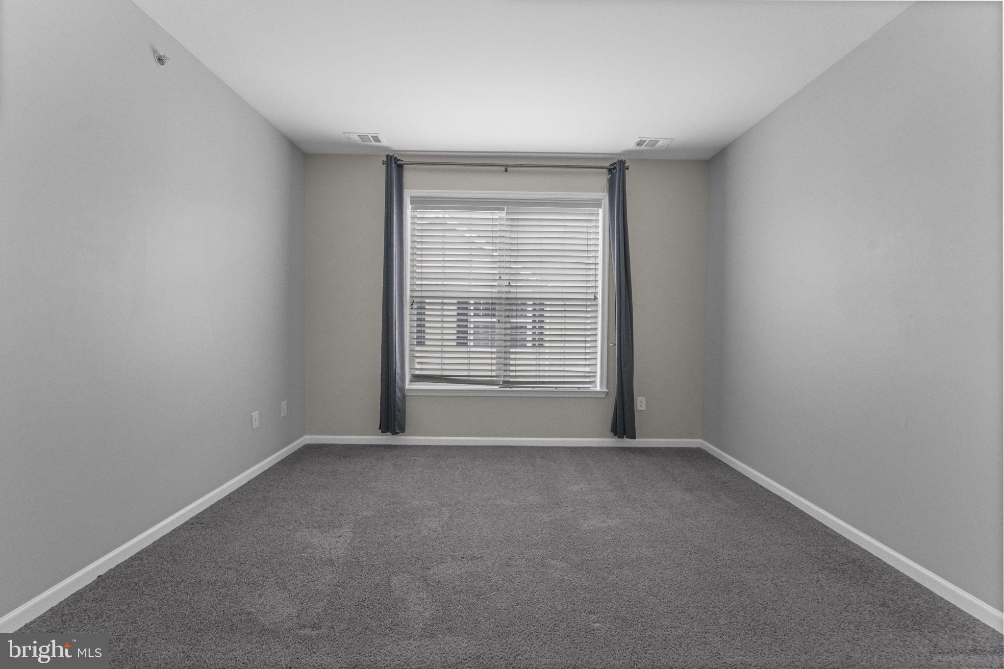 59 Kyle Way Ewing, NJ 08628 - Photo 12 of 35 a view of an empty room with a window