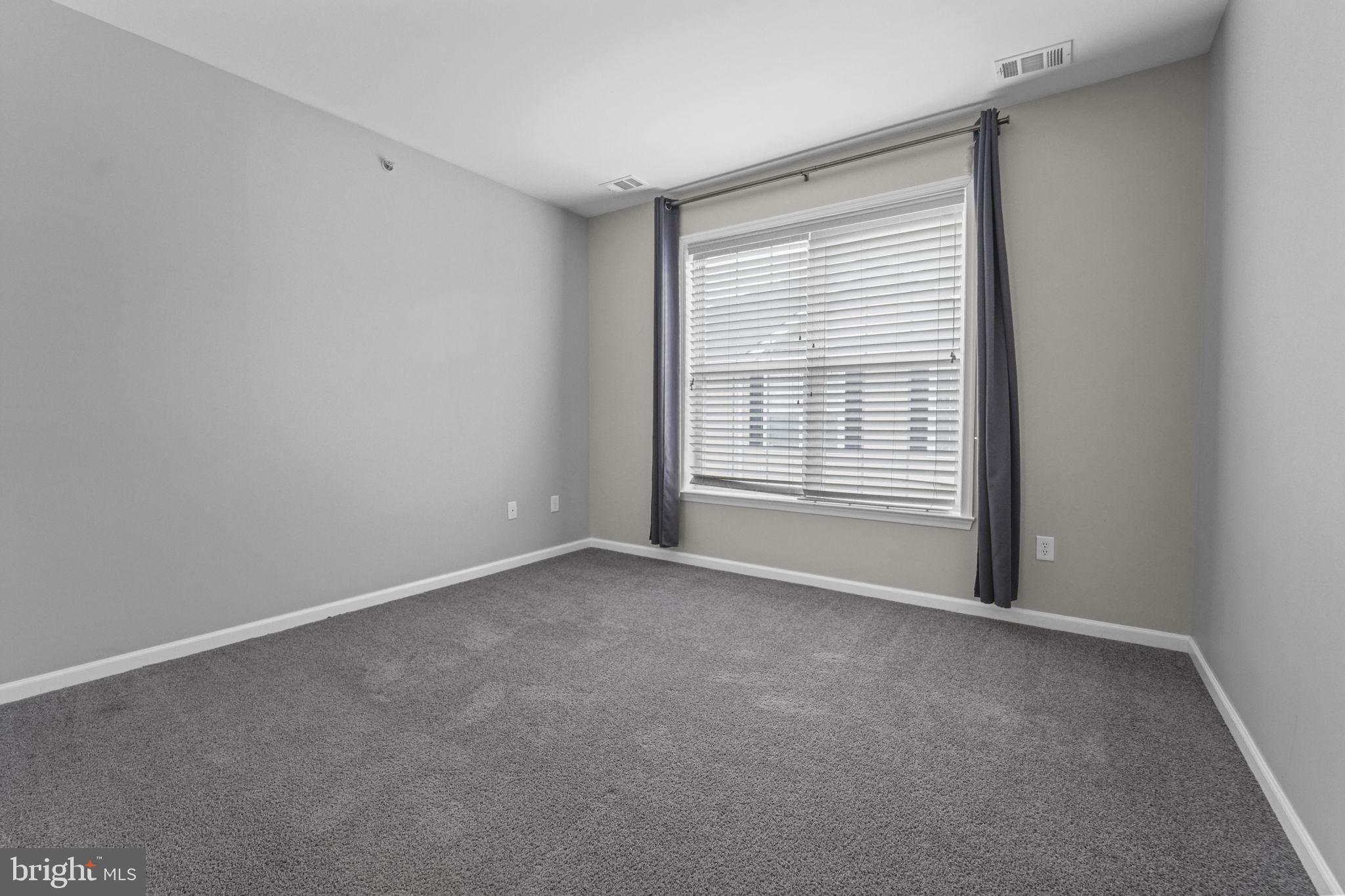 59 Kyle Way Ewing, NJ 08628 - Photo 13 of 35 a view of an empty room with a window