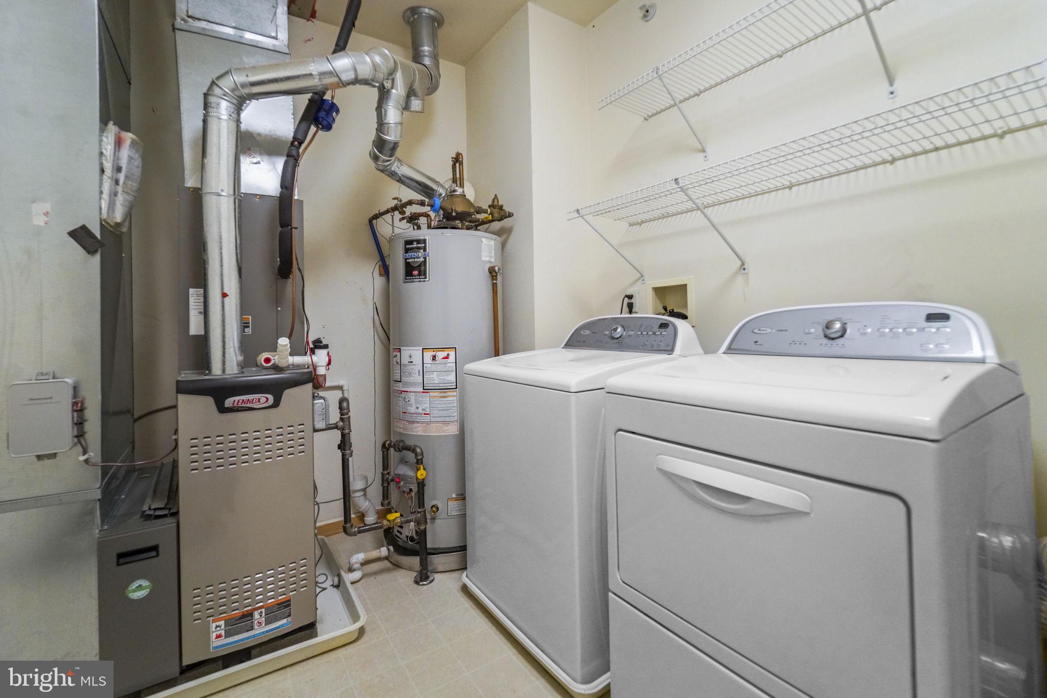 59 Kyle Way Ewing, NJ 08628 - Photo 29 of 35 a view of storage and utility room with washer and dryer