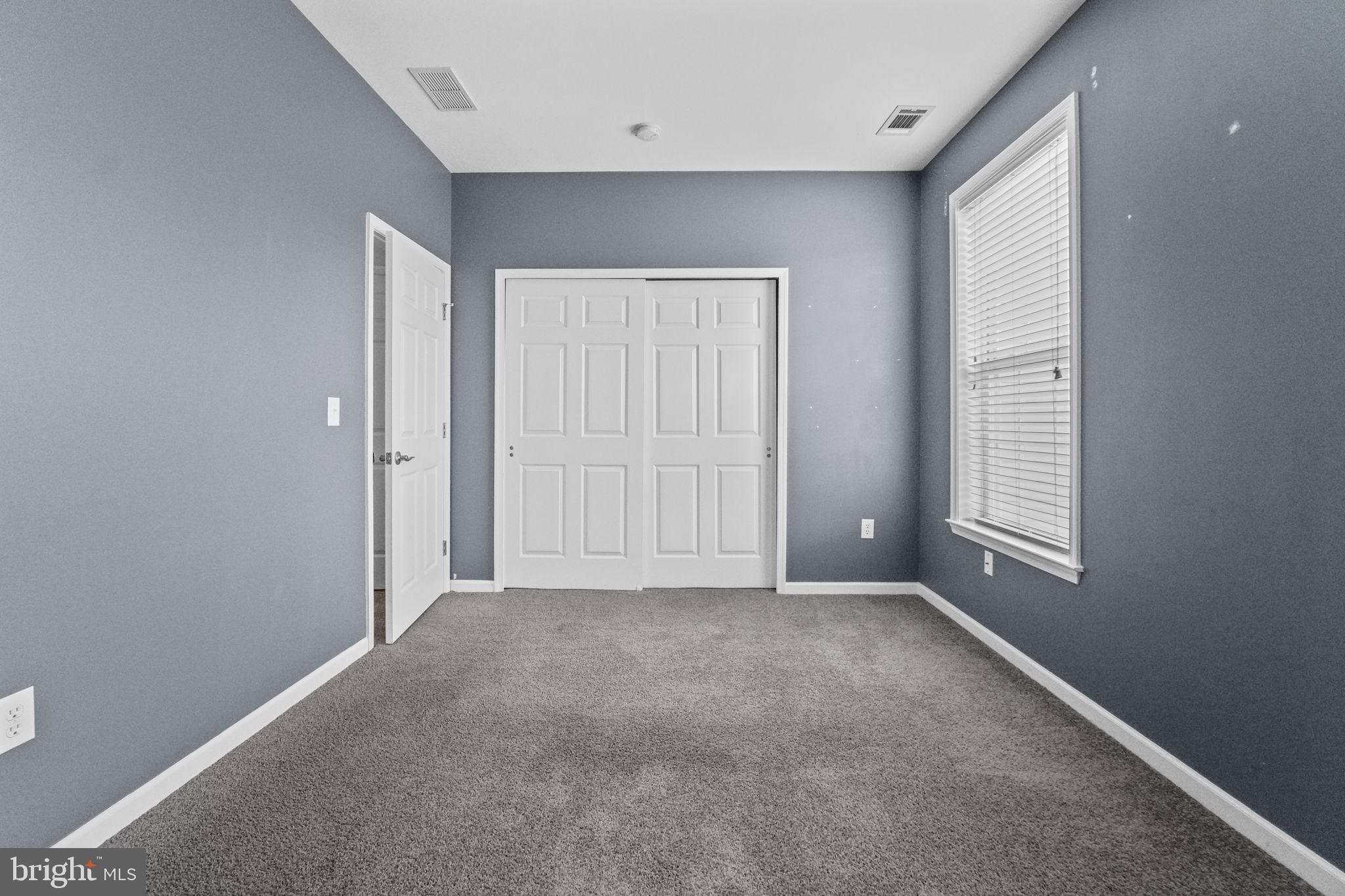 59 Kyle Way Ewing, NJ 08628 - Photo 5 of 35 a view of an empty room with a window