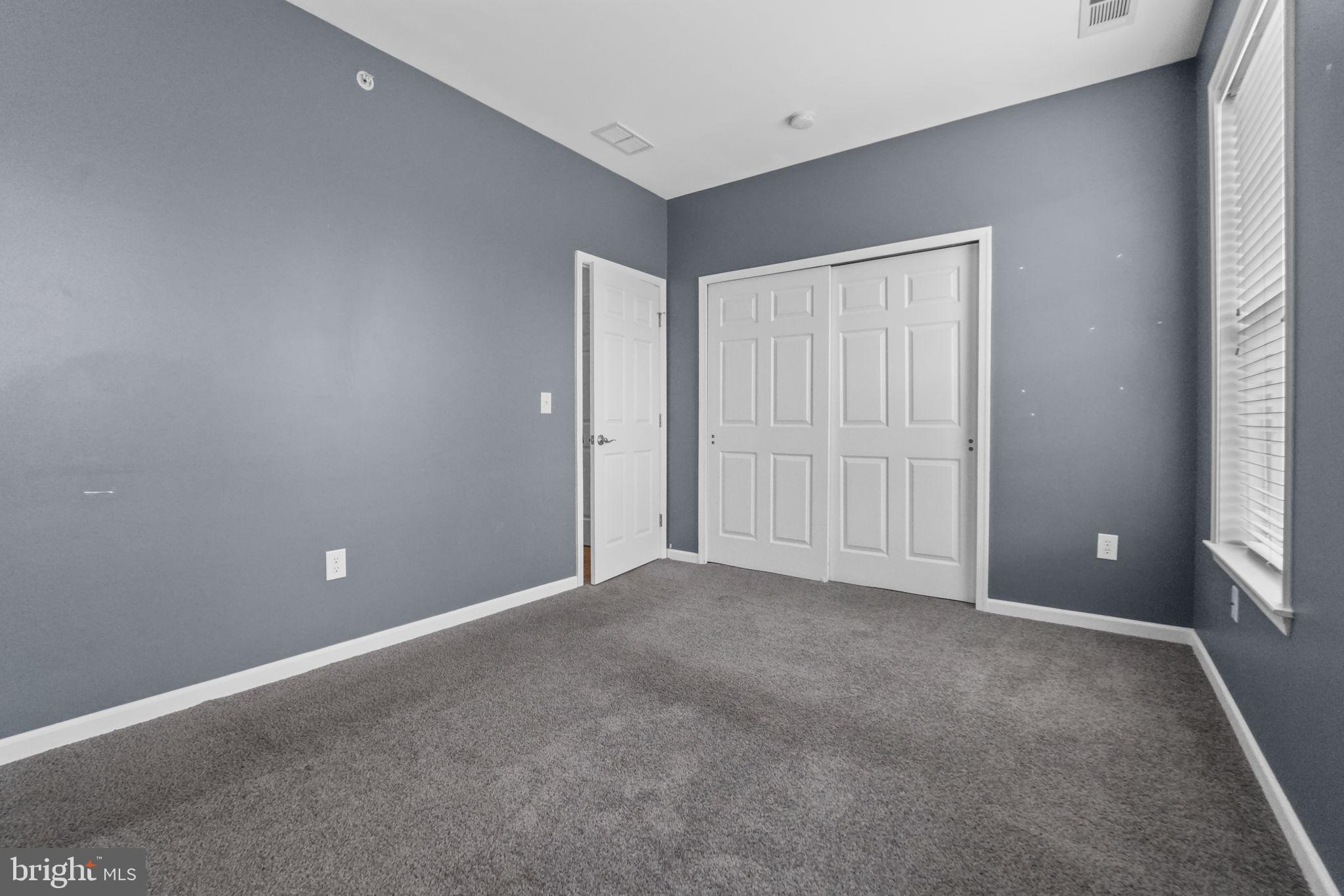 59 Kyle Way Ewing, NJ 08628 - Photo 6 of 35 a view of an empty room with a window