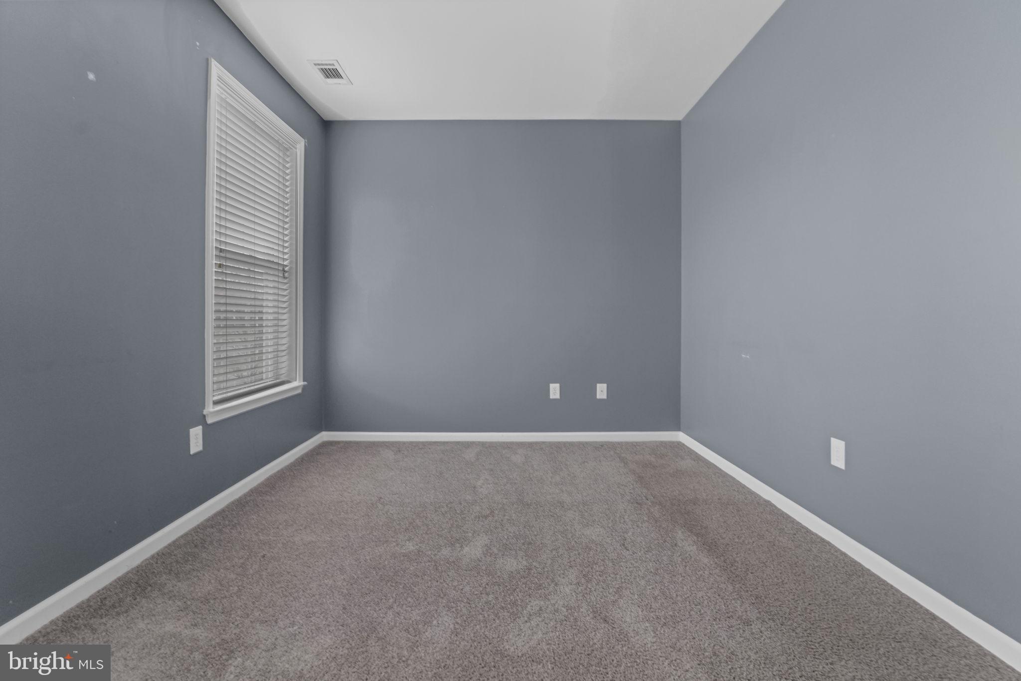 59 Kyle Way Ewing, NJ 08628 - Photo 8 of 35 a view of an empty room with a window