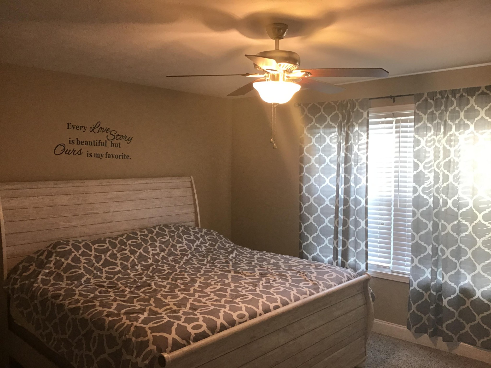 1604 Tilley Road Talbott, TN 37877 - Photo 11 of 31 a bed sitting in a room next to a window
