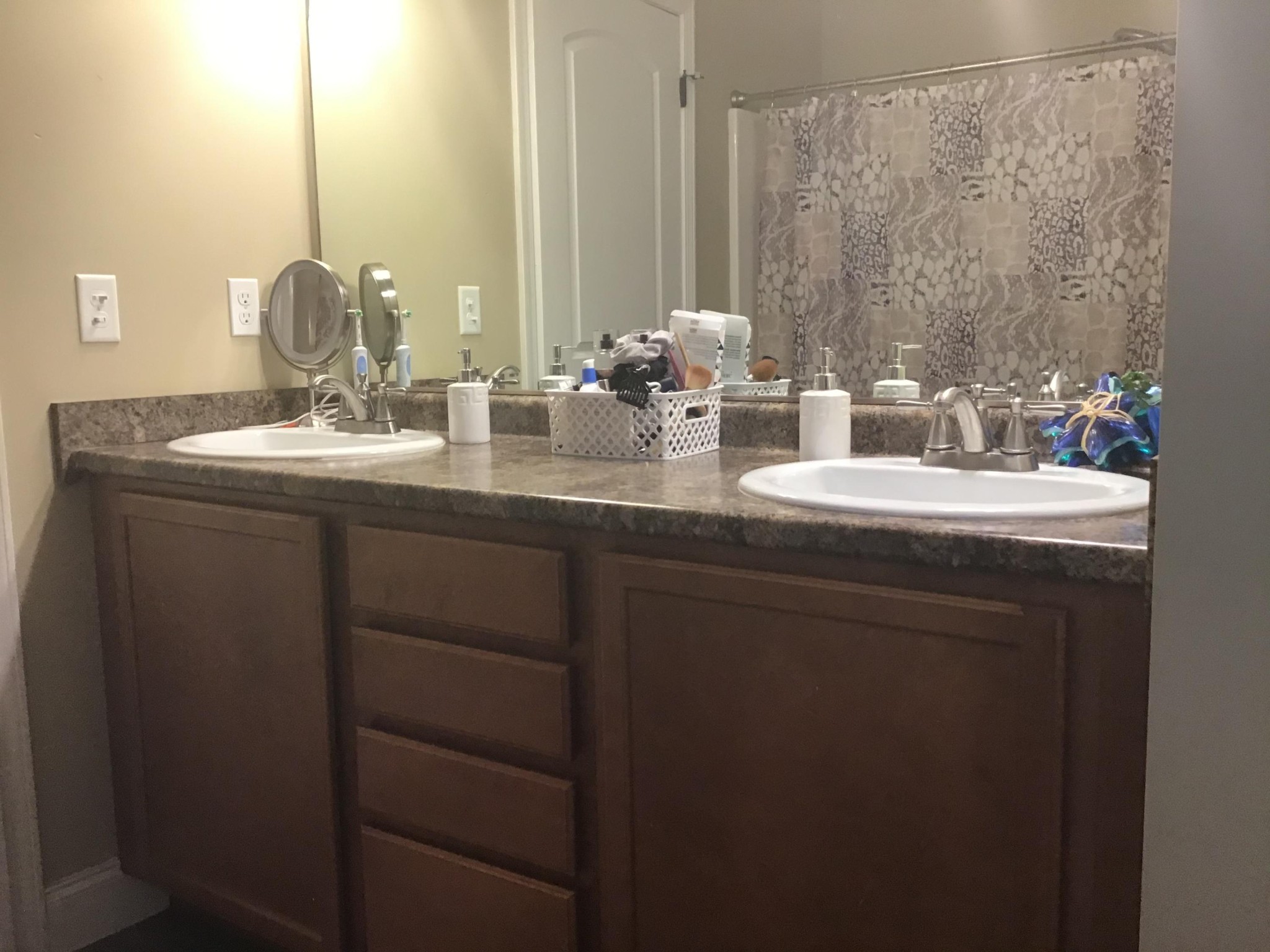 1604 Tilley Road Talbott, TN 37877 - Photo 14 of 31 a bathroom with a double vanity sink and a mirror
