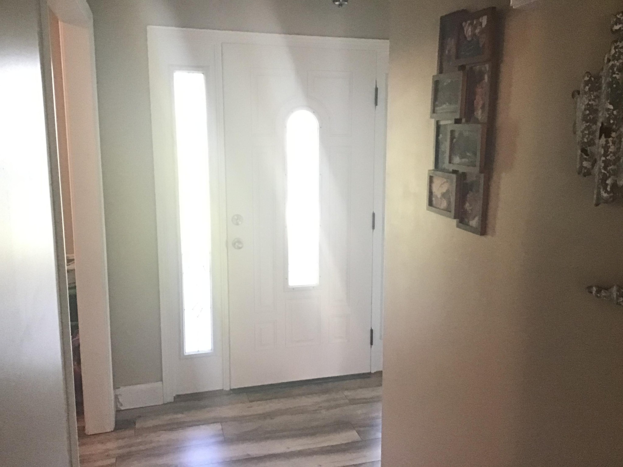 1604 Tilley Road Talbott, TN 37877 - Photo 16 of 31 an empty room with wooden floor and windows