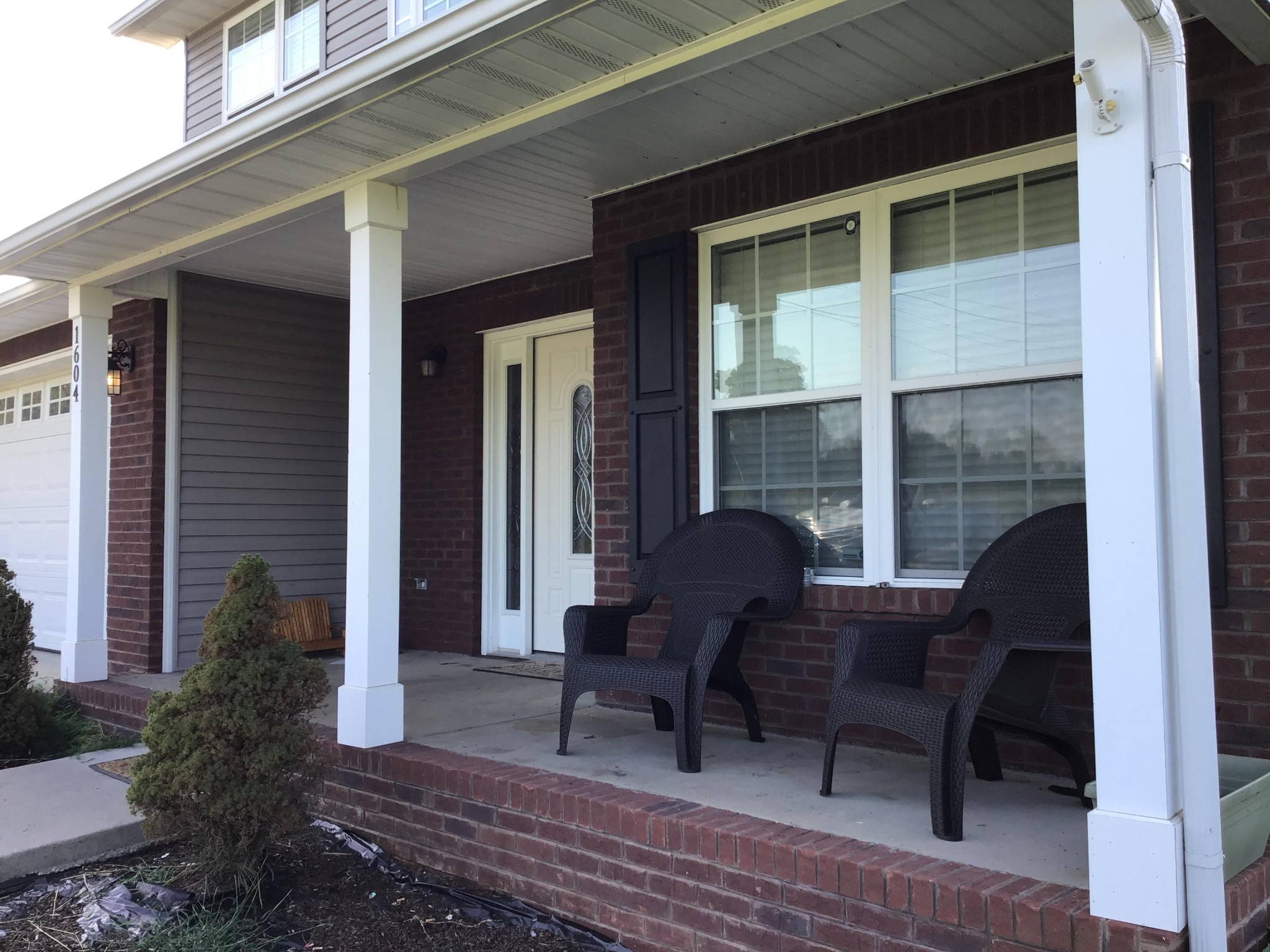1604 Tilley Road Talbott, TN 37877 - Photo 2 of 31 a view of a house with chairs and a table in a patio