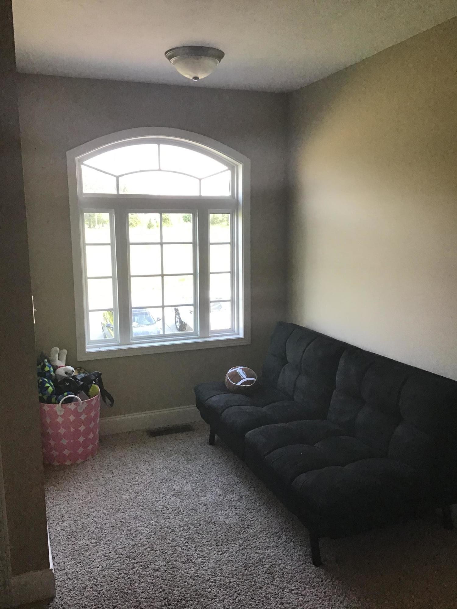 1604 Tilley Road Talbott, TN 37877 - Photo 21 of 31 a living room with furniture and a potted plant