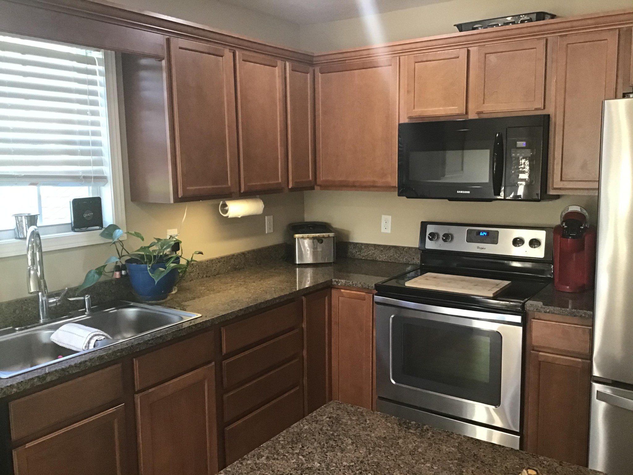 1604 Tilley Road Talbott, TN 37877 - Photo 6 of 31 a kitchen with a sink stove and microwave