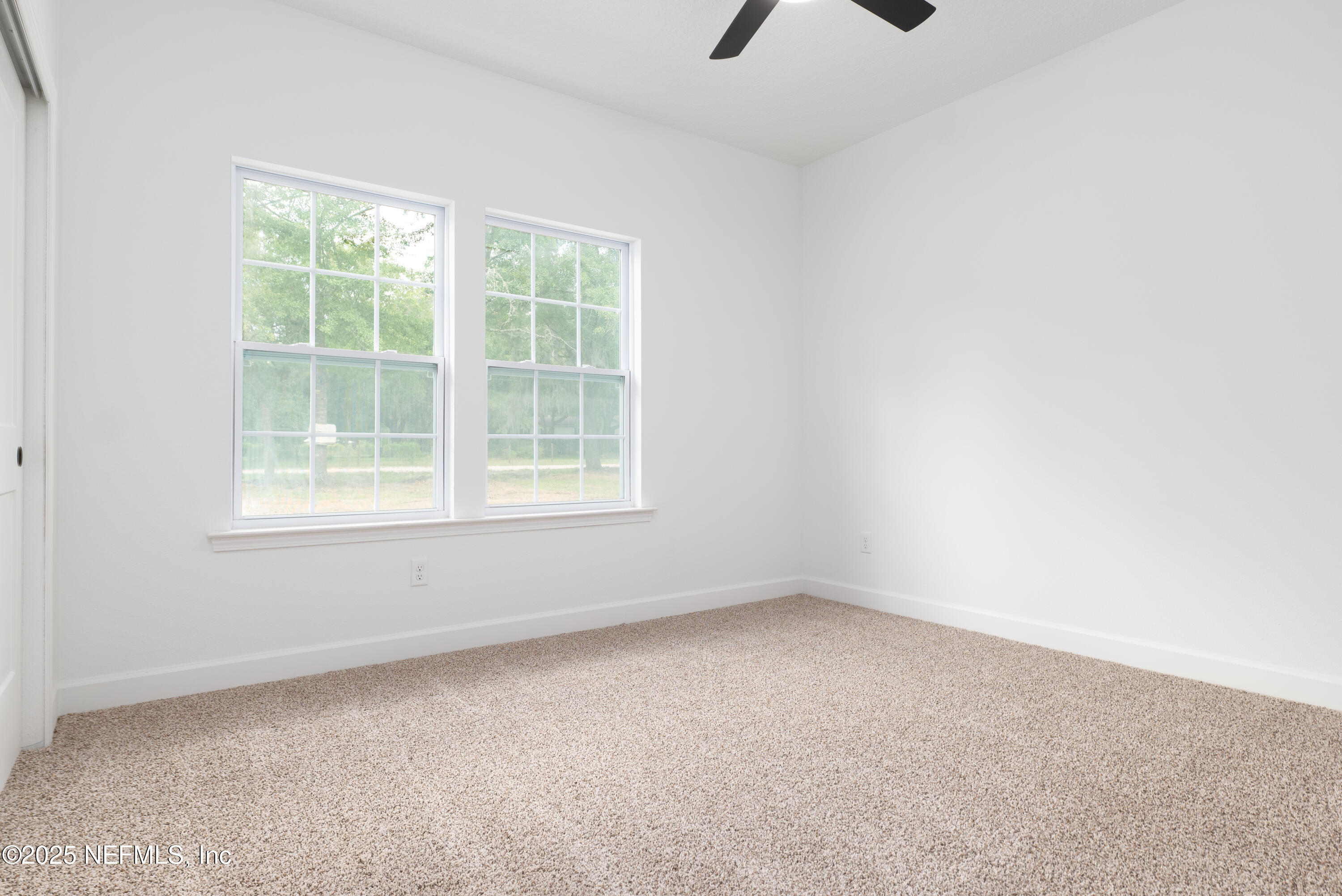 2410 Daisy Street Middleburg, FL 32068 - Photo 20 of 25 an empty room with a window