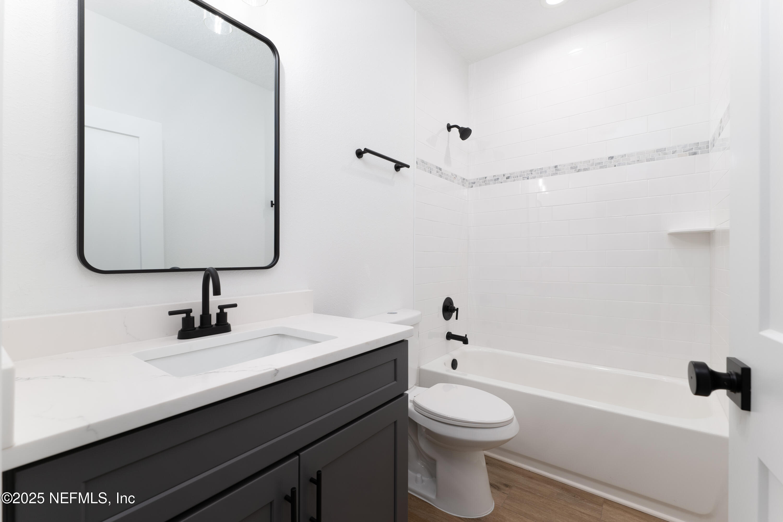 2410 Daisy Street Middleburg, FL 32068 - Photo 22 of 25 a bathroom with a sink a toilet and shower