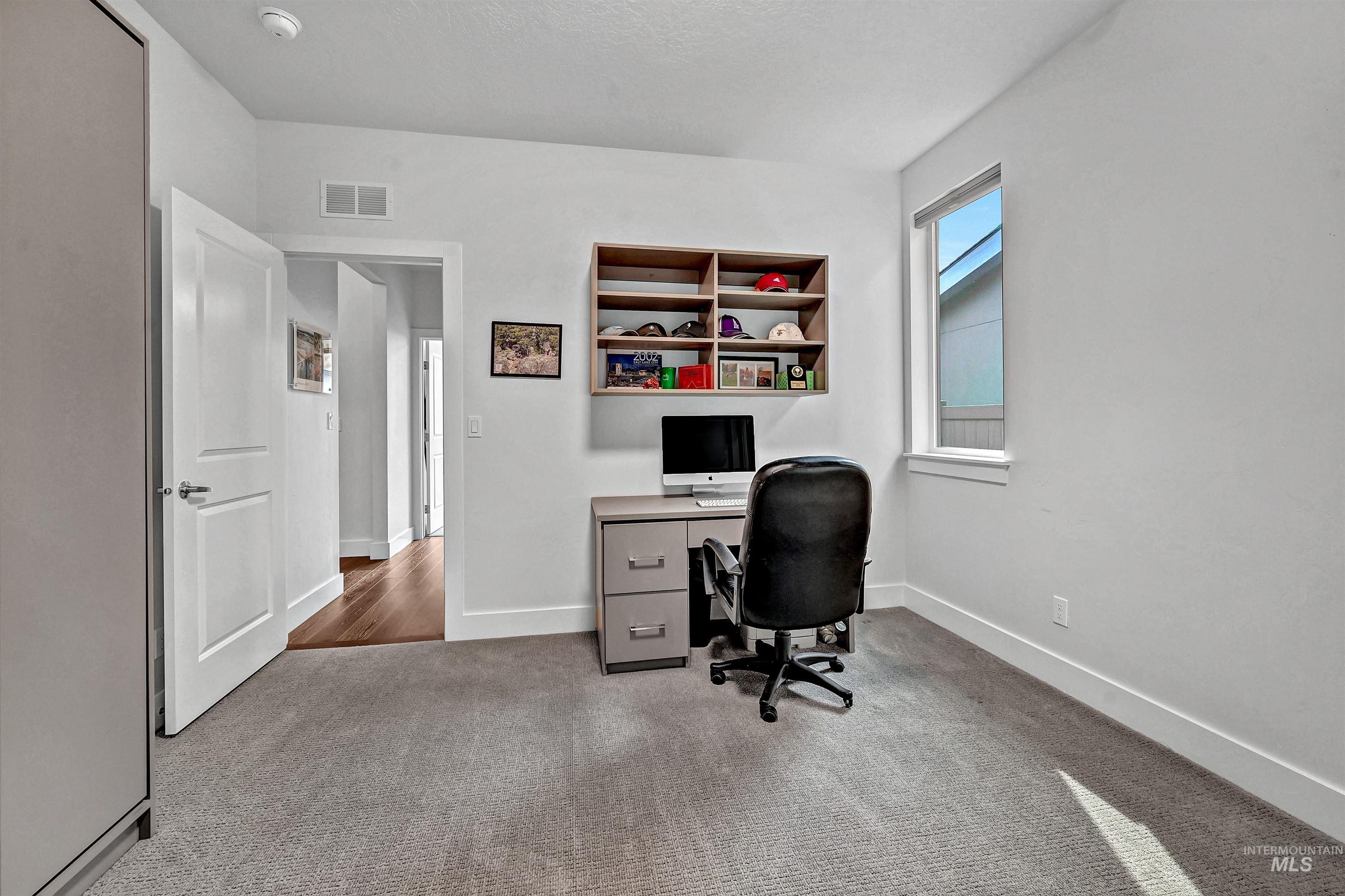 1525 South Boulder View Lane Boise, ID 83712 - Photo 19 of 34 Office with light carpet and baseboards