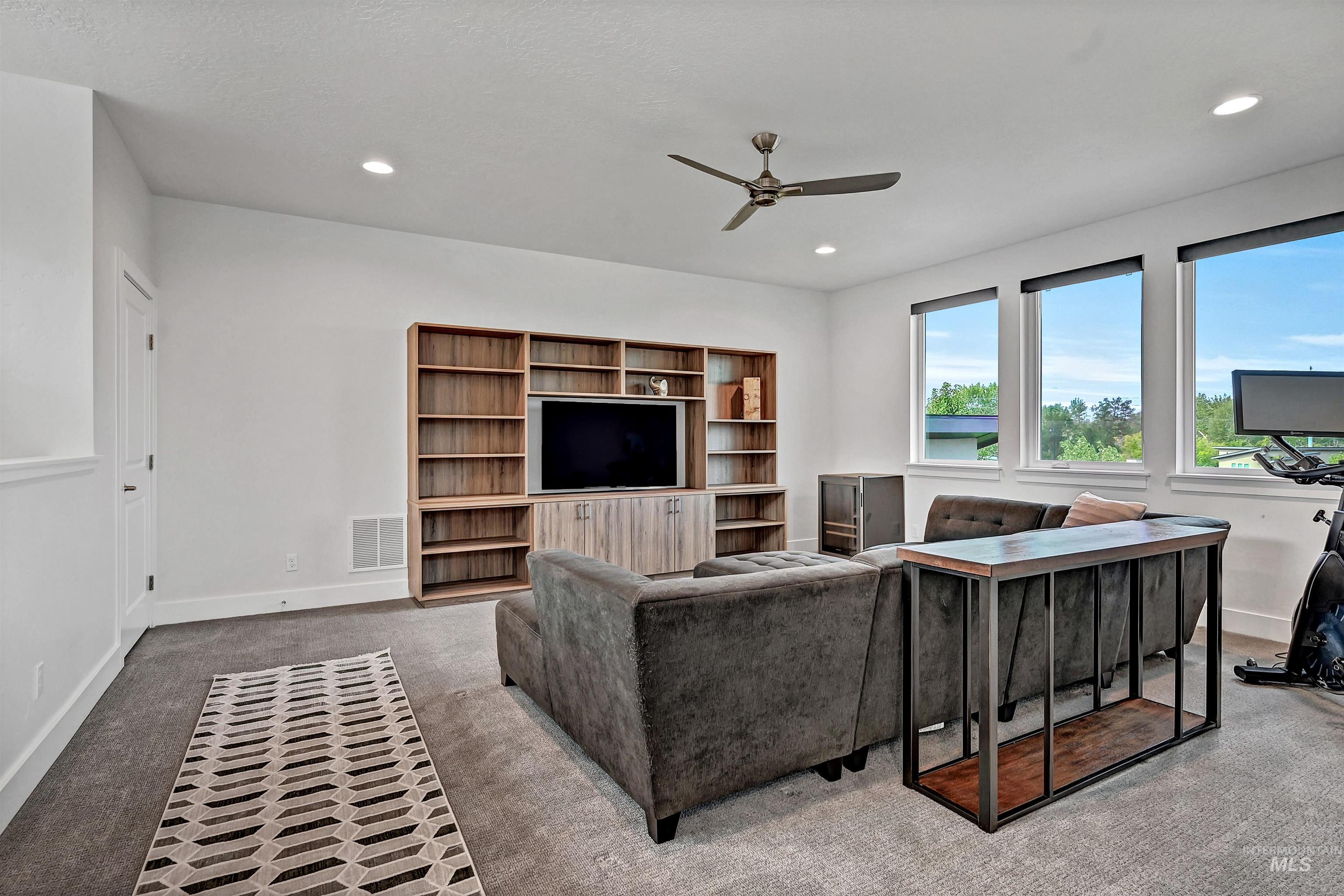 1525 South Boulder View Lane Boise, ID 83712 - Photo 21 of 34 Living area featuring carpet, a ceiling fan, and recessed lighting