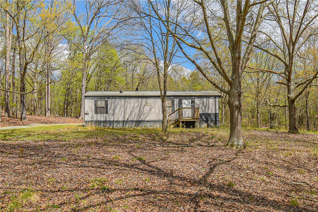 2716 Holders Siding Road Jefferson, GA 30549 - Photo 1 of 1 a view of a house with a yard