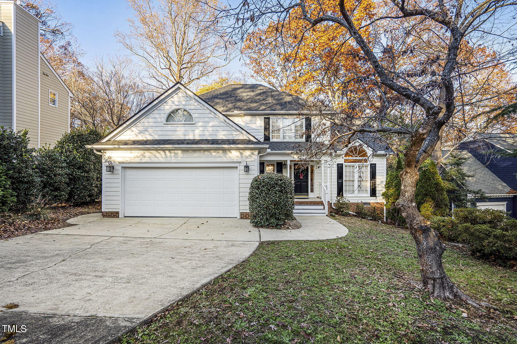 113 Waterfall Court Cary, NC 27513 - Photo 1 of 30 a front view of a house with a yard and garage