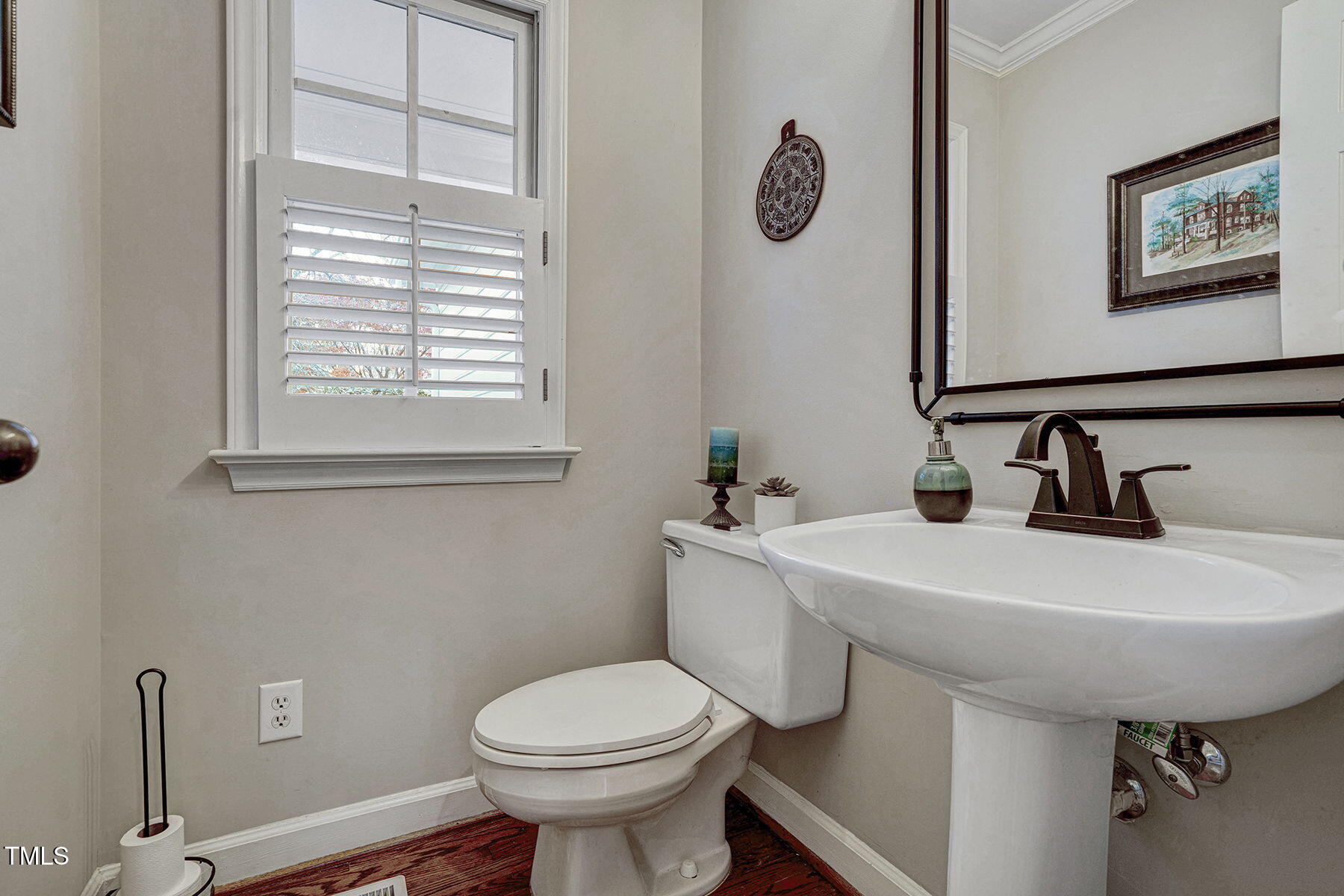 113 Waterfall Court Cary, NC 27513 - Photo 13 of 30 a bathroom with a sink toilet and a mirror