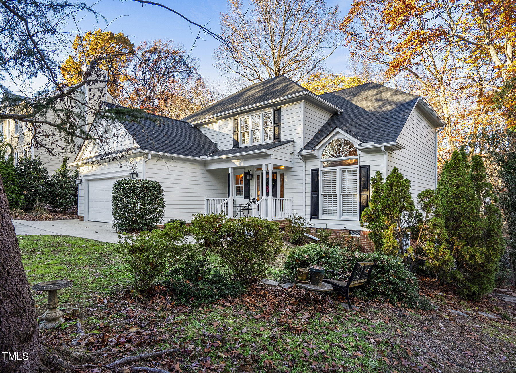 113 Waterfall Court Cary, NC 27513 - Photo 2 of 30 a front view of a house with a garden