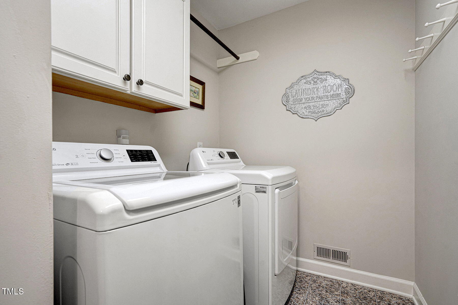 113 Waterfall Court Cary, NC 27513 - Photo 21 of 30 a utility room with dryer and washer