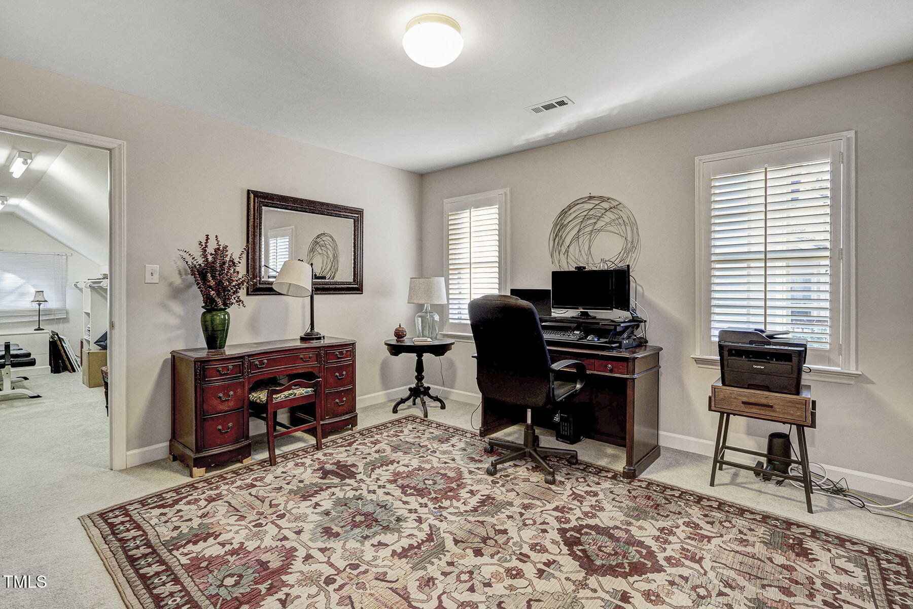 113 Waterfall Court Cary, NC 27513 - Photo 22 of 30 a view of a livingroom with workspace and a window