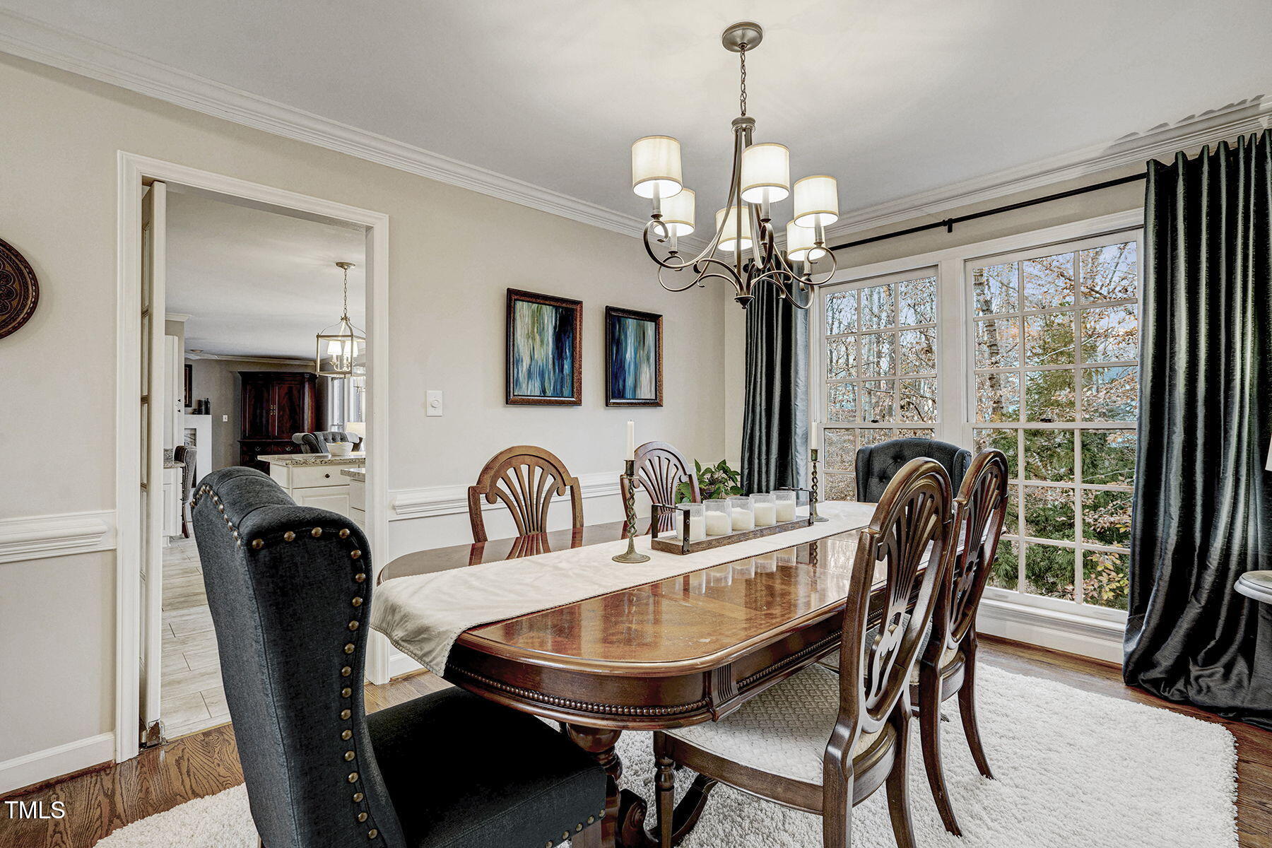 113 Waterfall Court Cary, NC 27513 - Photo 7 of 30 a view of a dining room with furniture window and wooden floor