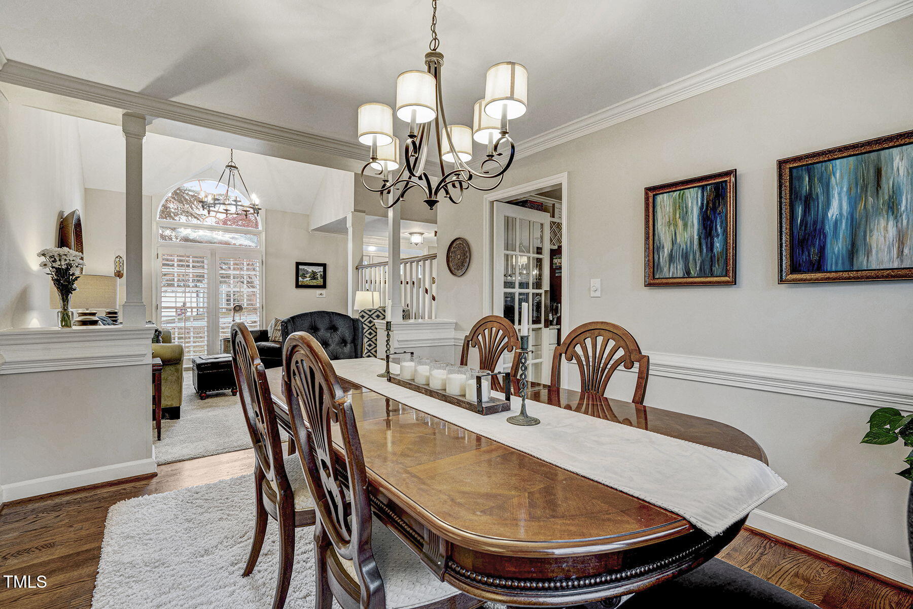 113 Waterfall Court Cary, NC 27513 - Photo 8 of 30 a dining room with furniture a chandelier and window