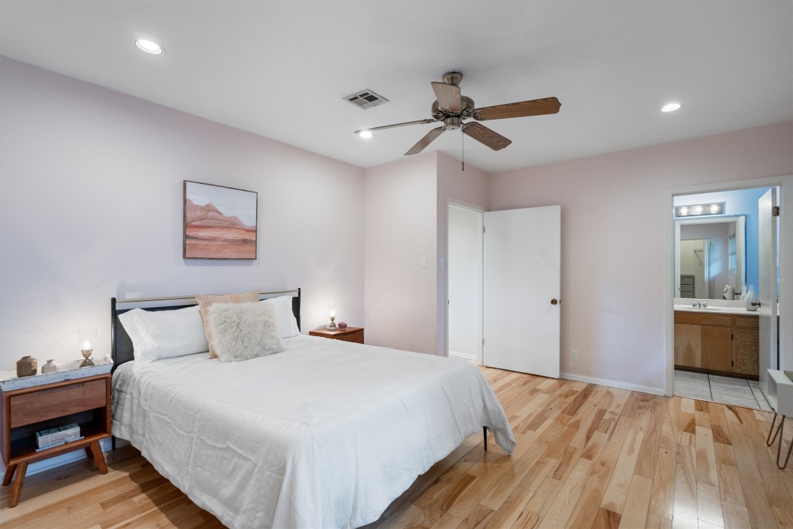 2116 Glendale Place Austin, TX 78704 - Photo 18 of 24 a bedroom with a bed and a dresser