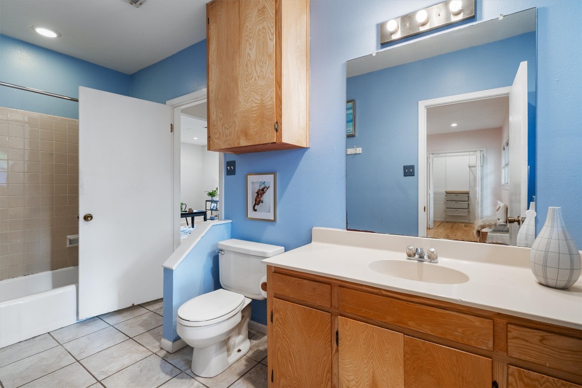 2116 Glendale Place Austin, TX 78704 - Photo 19 of 24 a bathroom with a sink a toilet and shower