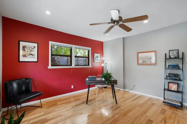 a workspace with furniture and window