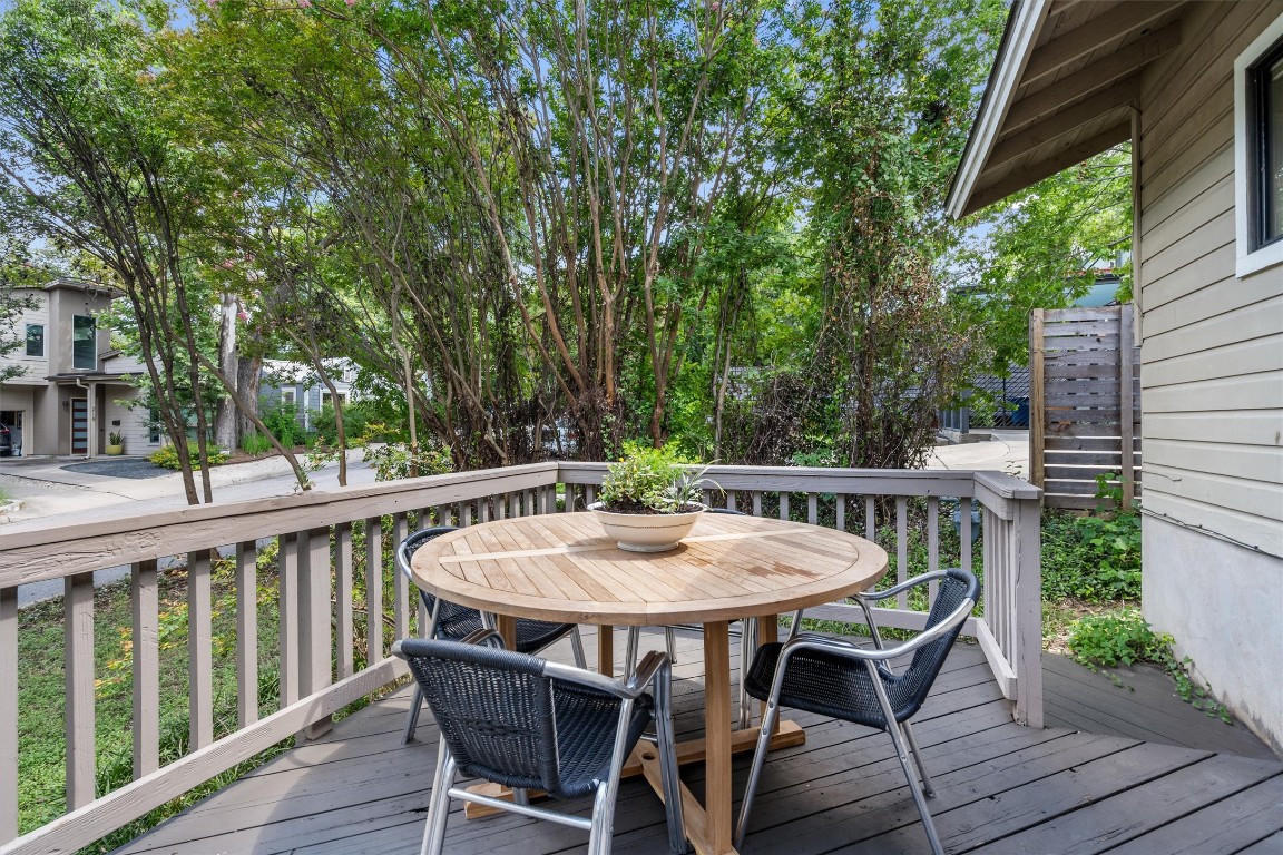 2116 Glendale Place Austin, TX 78704 - Photo 4 of 24 a view of a patio with table and chairs