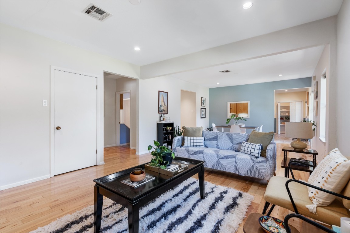 2116 Glendale Place Austin, TX 78704 - Photo 7 of 24 a living room with furniture and wooden floor