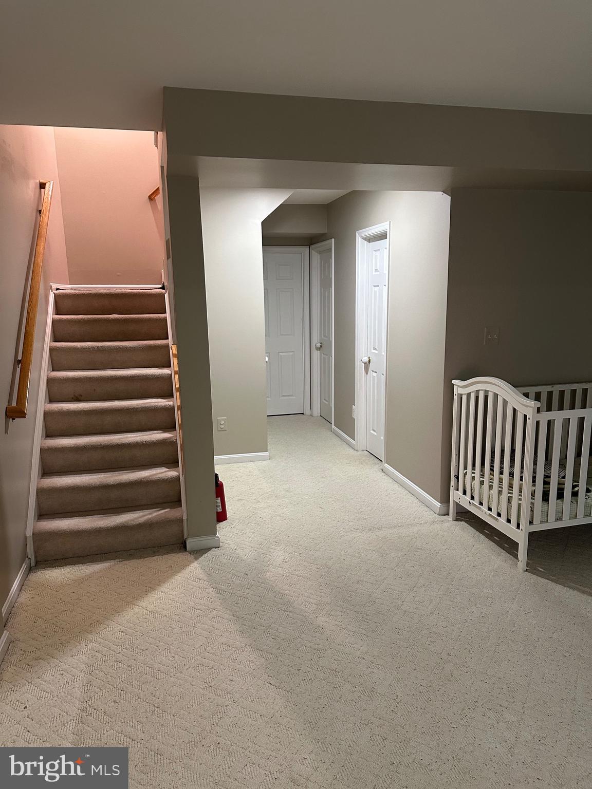 9077 Two Bays Road Lorton, VA 22079 - Photo 18 of 22 a view of an empty room with a staircase