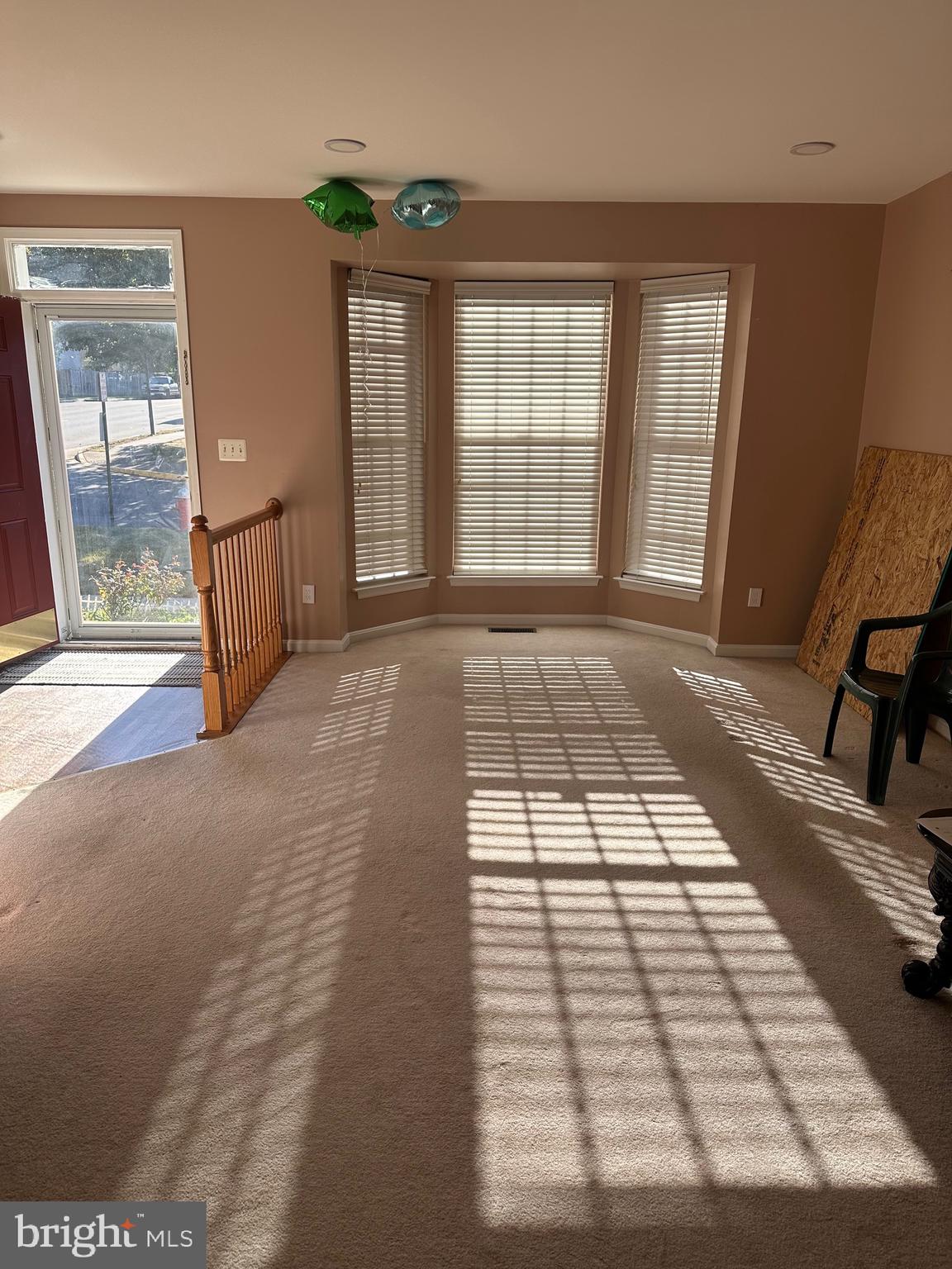 9077 Two Bays Road Lorton, VA 22079 - Photo 4 of 22 a view of an empty room and window