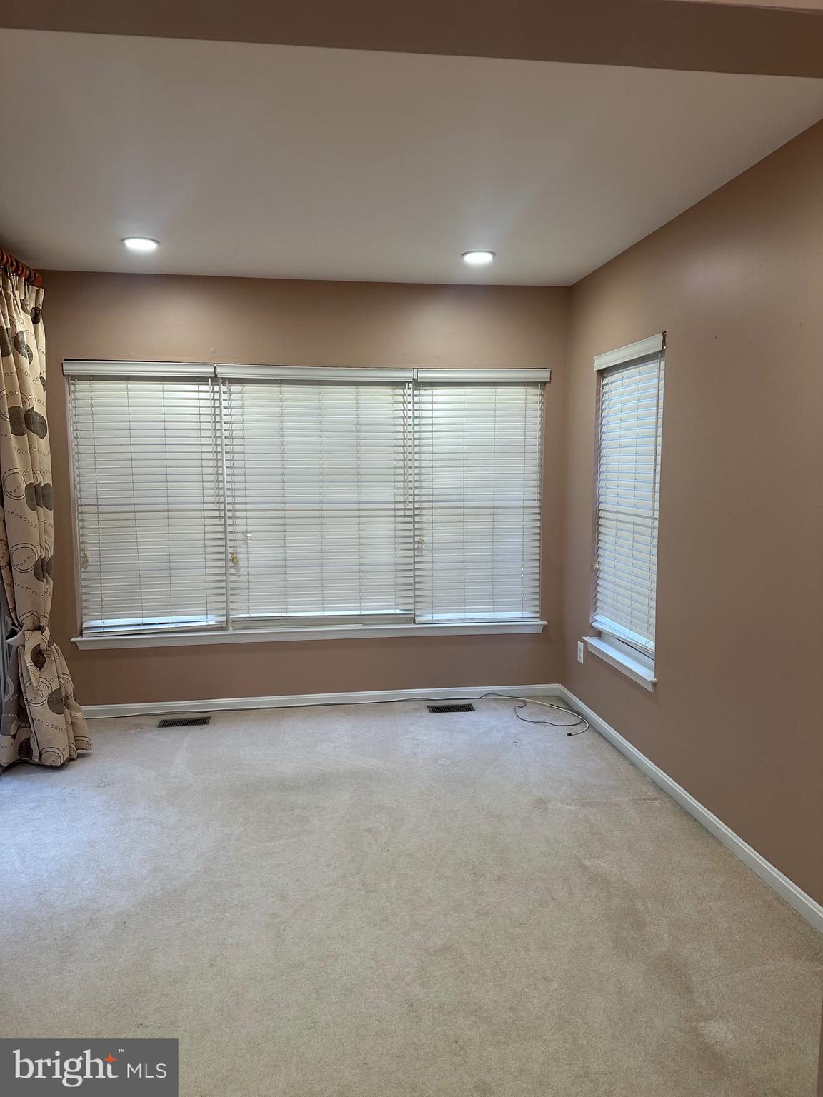 9077 Two Bays Road Lorton, VA 22079 - Photo 5 of 22 an empty room with windows
