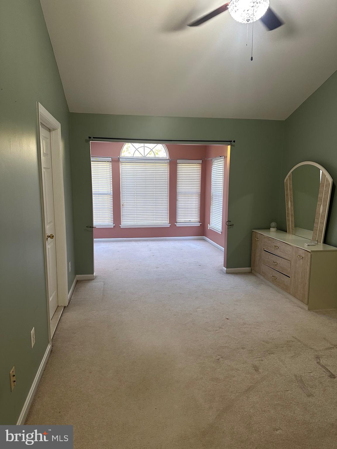 9077 Two Bays Road Lorton, VA 22079 - Photo 10 of 22 a view of a livingroom with furniture and chandelier fan