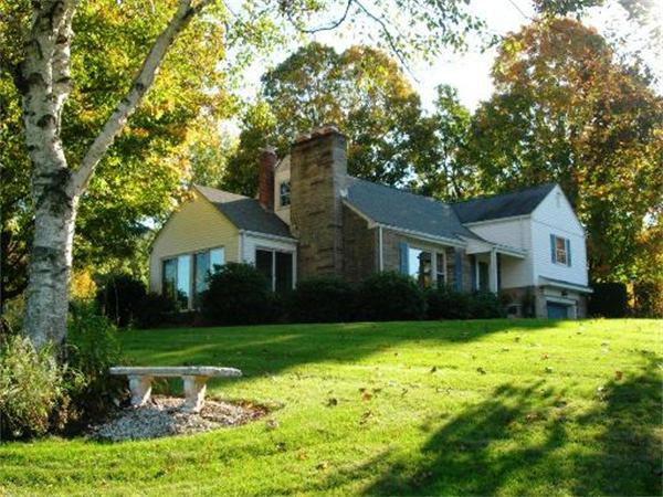 111 Scully Road Somers, CT 06071 - Photo 1 of 26 a front view of a house with garden