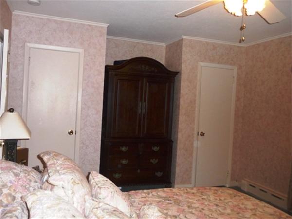 111 Scully Road Somers, CT 06071 - Photo 11 of 26 a bedroom with a bed and a closet